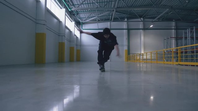 roller skating guy does the trick at the logistic center and falls