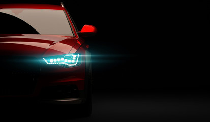 Stylish car on a black background with led lights on. Futuristic modern vehicle head light xenon on...
