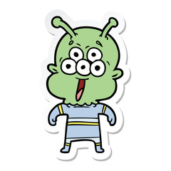 sticker of a happy cartoon alien