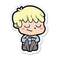 sticker of a cartoon happy boy