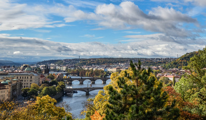 Naklejka premium Gorgeous view on Prague city center, Vltava river and cascade of bridges, Czech Republic. Autumn Prague.