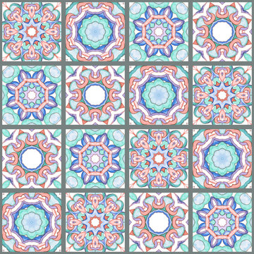 Watercolor seamless pattern with ethnic geometric motifs in style of Spanish Azulejo. Abstract fishnet Oriental arabesques in delicate pink, green and blue shades for ceramics, textile and pacaging