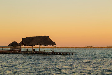 sunset in Lagoon of Seven Colors in Bacalar,Quintana Roo, México.