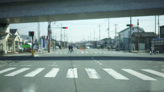 4K 24fps Dash Camera footage driving around Japan. A mix of Japanese highways and Japanese city streets. Unfocused to prevent anything from being recognizable.