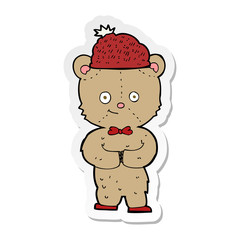 sticker of a cartoon bear in hat