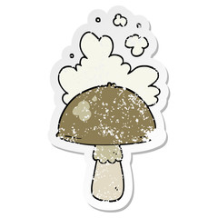 distressed sticker of a cartoon mushroom with spore cloud