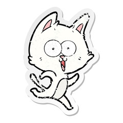 distressed sticker of a funny cartoon cat