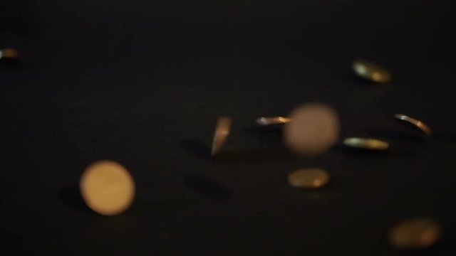 Coins falling slow-mo Sony a6300 100fps