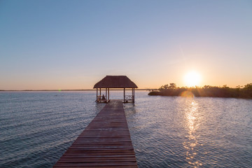 Sunrise, meditation in the lagoon of the seven colors, in Bacalar, Quintana Roo, Mexico.