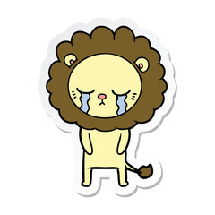 sticker of a crying cartoon lion