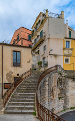 Fototapeta na wymiar Street stairs in the ancient baroque town of Ragusa in Sicily, Italy