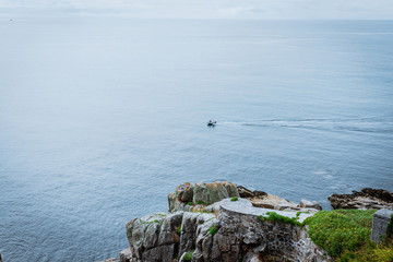 A view from the cliff top down towards the Minack Theatre near Porthcurno on the South Coast of Cornwall, England UK