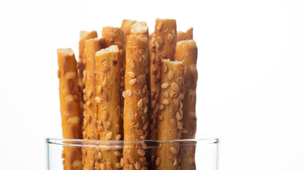 Sesame sticks on a white background