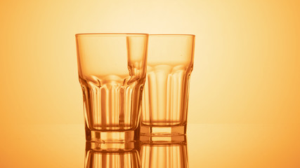 glass of water on color background