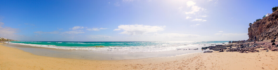 Fototapeta na wymiar Panorama of the sandy beach on the Canary Islands