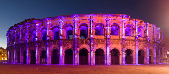 Panorama of colorful lighted Arena of Nimes