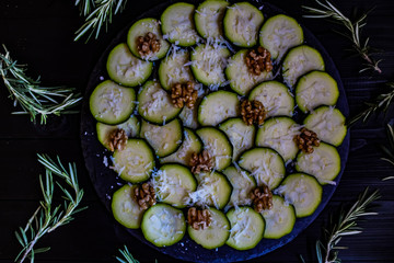 Carpaccio of zucchini with nuts and cheese