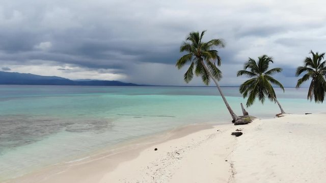 aerial tropical beach with beach hut and palm trees San Blas Islands Panama Guna Yala