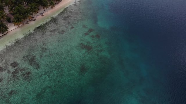 aerial tropical island beach with palm trees and copy space in San Blas archipelago Guna Yala Panama