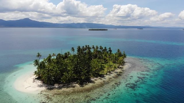 cinematic aerial view of remote coral island in San Blas archipelago Guna Yala, Panama