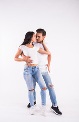 Salsa, kizomba and bachata dancers on white background. Social dance concept