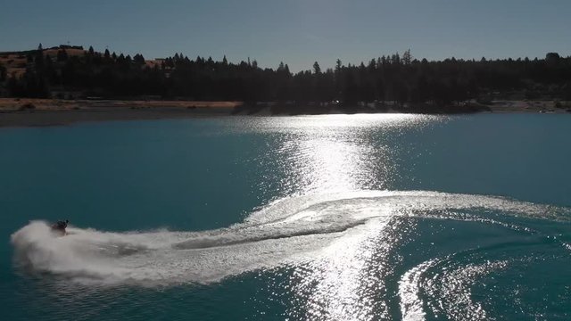 Jet Ski on Beautiful Turquoise Blue Water - Lake Tekapo, New Zealand - Aerial