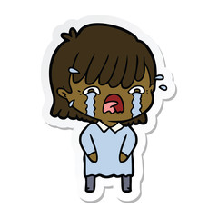 sticker of a cartoon girl crying