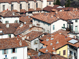 Fototapeta na wymiar above view of old urban houses in Bergamo town