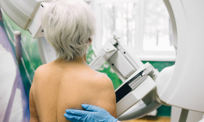 Senior woman having a mammography scan at hospital