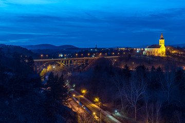 The viaduct and St. Leslie church at evening in Veszprém, Hungary.