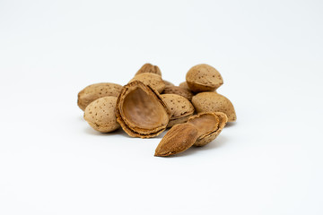Group of almonds isolated on white background