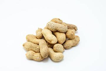Group of peanuts stacked and isolated on white background