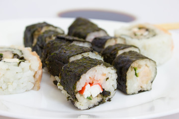 Japanese cuisine, rice sushi and fish - closeup