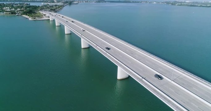 Aerial Pan and Tilt of the John Ringling Causeway Bridge Revealing the Beautiful Bay in Sarasota Florida