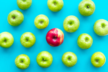 summer fruit pattern with apples on blue colorful background top view
