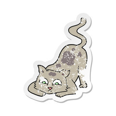 retro distressed sticker of a cartoon cat