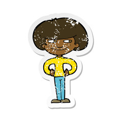 retro distressed sticker of a cartoon boy with hands on hips