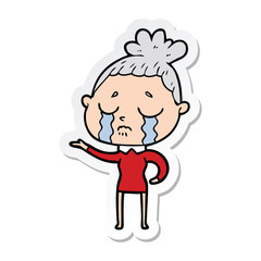 sticker of a cartoon crying woman