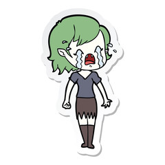 sticker of a cartoon crying vampire girl