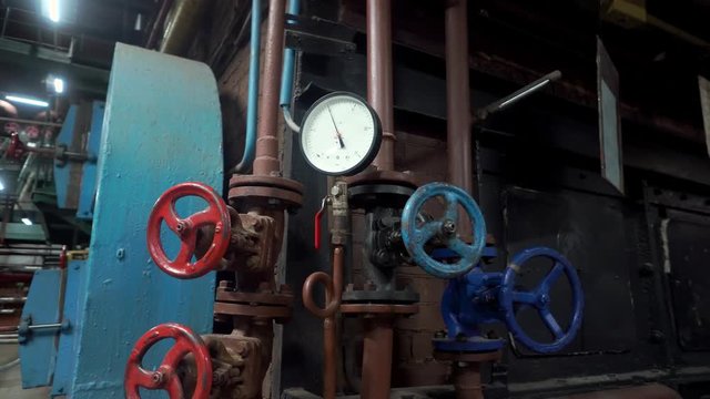 background vintage steampunk from steam pipes and pressure gauge