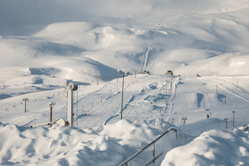 Hlidarfjall ski areal resort overlooking Akureyri in northern Iceland in the winter with a lot of snow