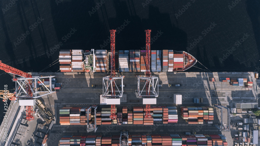 Wall mural container cargo ship in import export business logistic, freight transportation, aerial view.