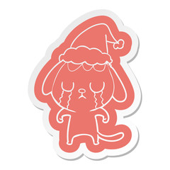 cute cartoon  sticker of a dog crying wearing santa hat
