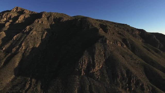 Aerial drone shot of the mountains of the National Park of Peguin in Chihuahua at sunset.