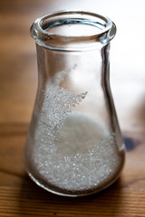 Single crystals distinctly visible in erlenmeyer flask