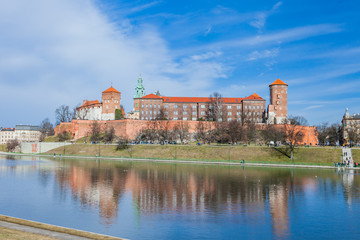 Fototapeta na wymiar POLAND, KRAKOW - FEBRUARY 23, 2019: Wawel, Royal Castle and cathedral in Cracow (Krakow), Poland. Panorama view from inside of the castle.