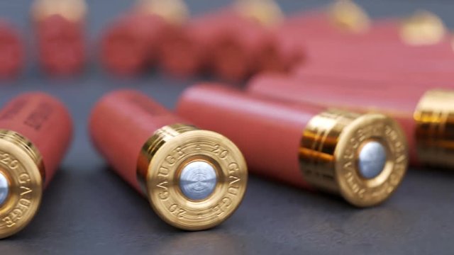 Animation with 20 gauge shotgun shells on a production line. Deadly ammo. Loop.