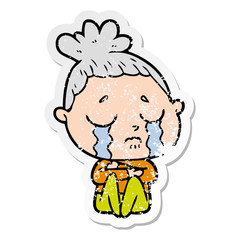 distressed sticker of a cartoon crying woman hugged up