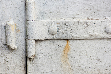 Old metal door hinge shaded paint