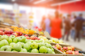 Fresh fruits on shelf in supermarket. Selected focus